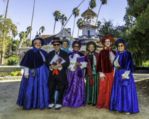 QA Carolers 54189148377_dcb4dd1b9c_k-1-300x240